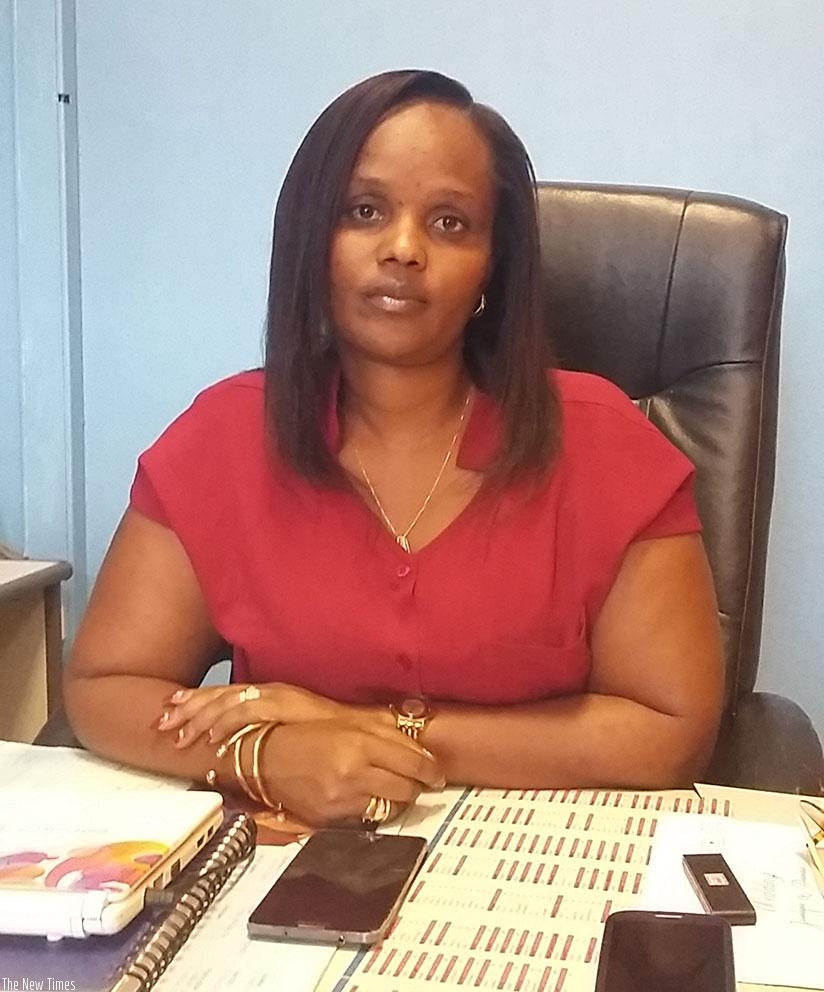 Jacky Murebwayire at her office in Nyarungenge, Kigali.  (Courtesy photos)