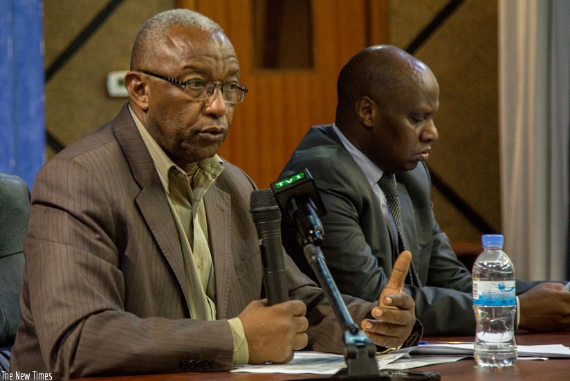 Electoral Commission chairman Kalisa Mbanda and EC Executive Secretary Charles Munyaneza during a press conference recently. The Electoral Commission has modified regulations relating to usage of social media during presidential campaigns next month. Courtesy.