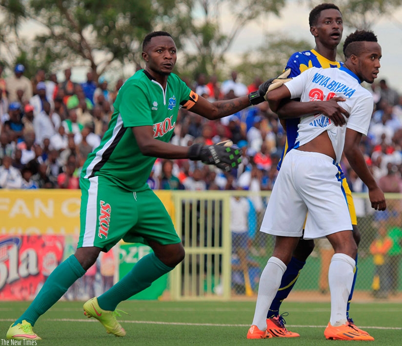 Eric Ndayishimiye  (L) has helped Rayon Sports to two league titles and one Peace Cup title since joing from APR FC nearly five years ago. S. Ngendahimana