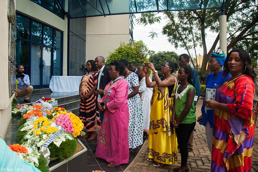 Families and friends lay wealth at the memorial of Ministry of Finance during the commemoration event on Friday. Nadege Imbabazi. 