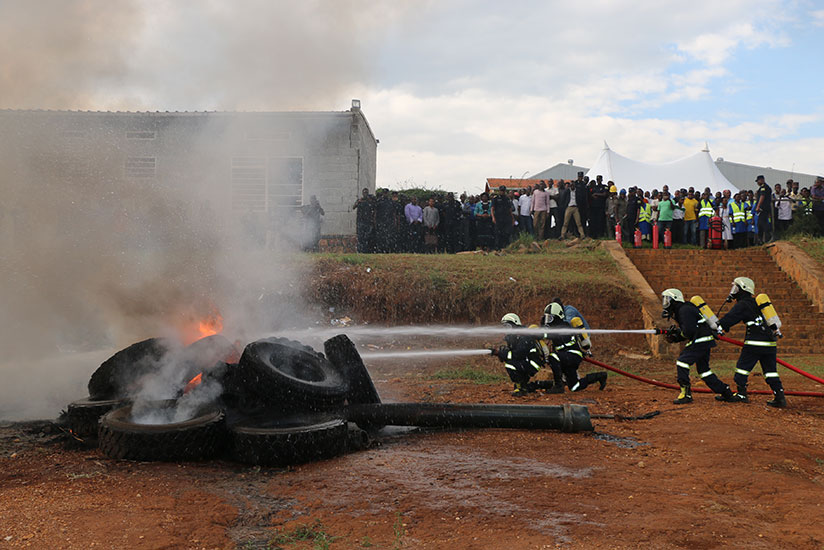 A firefighter putting out fire during the demonstration