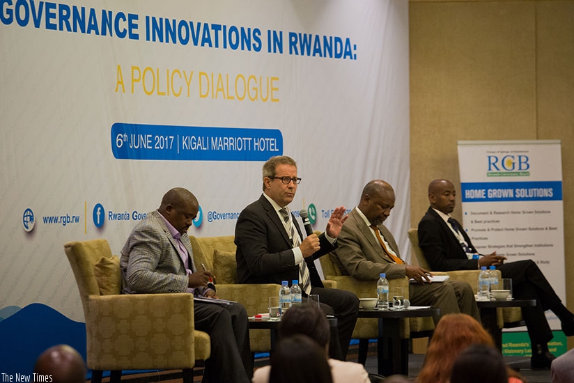 Panelists L-R; Egide Rugamba, secretary-general of Rwanda Association of Local Government Authorities; Dr Stephan Klingebiel, from German Development Institute; Wellars Gasamagera, director-general of Rwanda Management Institute; and Richard Mushabe, division manager at Finance and Economic Planning ministry at a policy dialogue on governance held in Kigali yesterday.  (Photos by Timothy Kisambira)