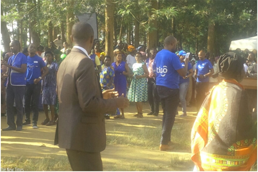 Bugesera residents welcome the Tigo staff. Joan Mbabazi.  