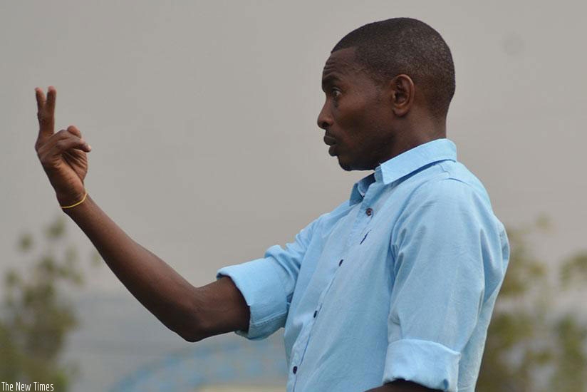 Rayon Sports head coach Djuma Masudi gestures on the touchline during a past match. File.