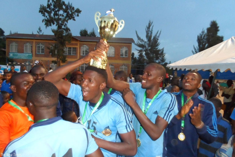 Police players celebrate after retaining the Genocide memorial tournament title. Courtesy.