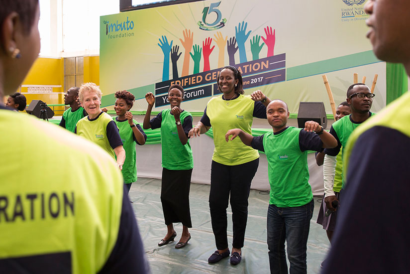 First Lady Jeannette Kagame dances with the youth during the Edified Generation Youth Forum. / Courtesy