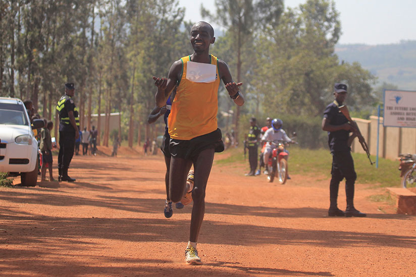 APR Athletics Club runner Alexis Nizeyimana celebrates his victory in the Bugesera 20 km race on Sunday in Nyamata. (All photos by Sam Ngendahimana)