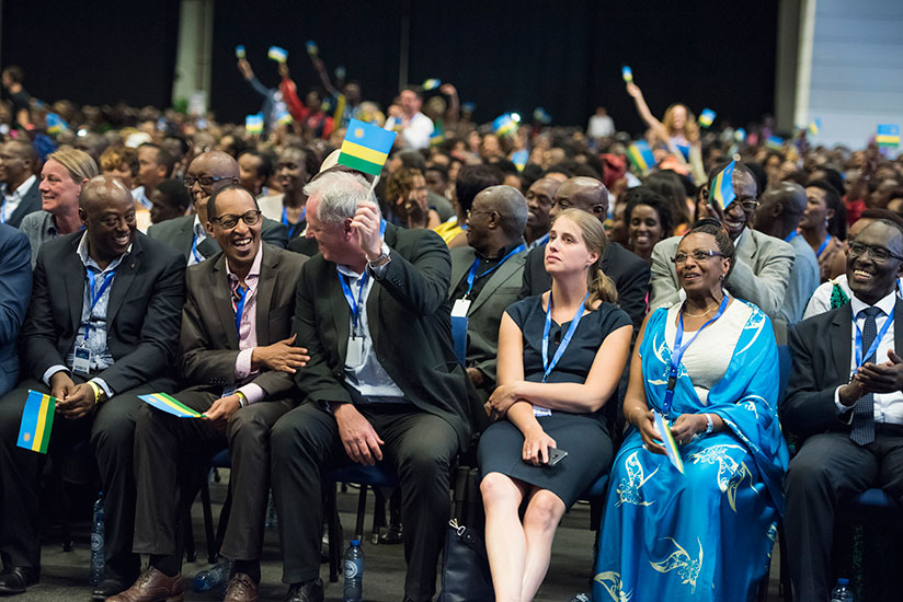 Participants share a light moment during Rwanda Day event in Gent, Belgium on Saturday. Rwandans and friends of Rwanda turned up in large numbers for the event. / Village Urugwiro