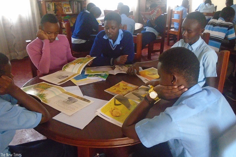 Students reading in the school library. Using different materials during revision helps one to grasp concepts better.  (Photos by Lydia Atieno)