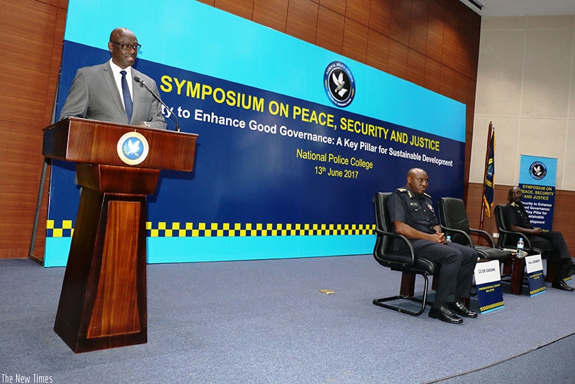 The Minister of Justice and Attorney General, Johnston Busingye giving a keynote address at the opening of the symposium.