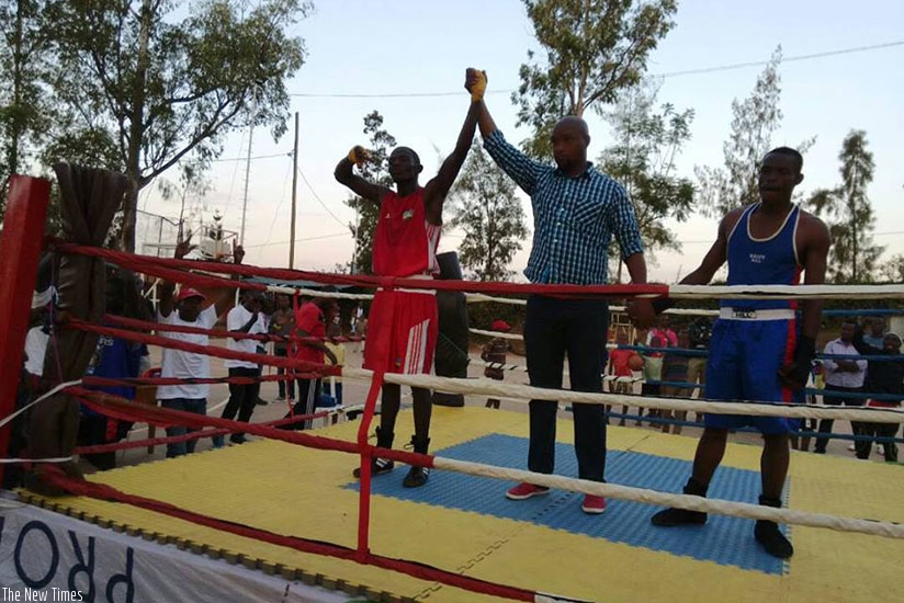 Jean Pierre Cyiza of Inkuba Boxing Club defeated Aron Emmanuel Bibutsuhoze in the 60kg bout to earn Gold in this year's Memorial Boxing Tournament. (Jejje Muhinde)