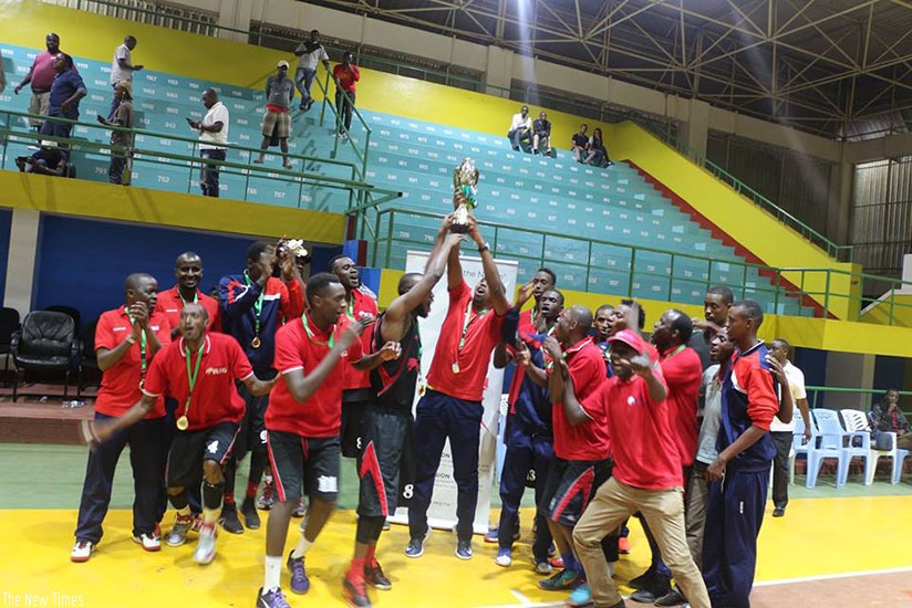 REG head coach Jean Bahufite lifts the title. (File)