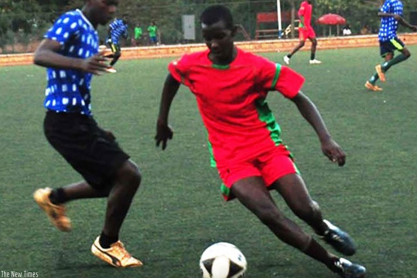 Kagarama secondary school (in red) beat NFF team 2-0 in the final. (F. Byaruhanga)