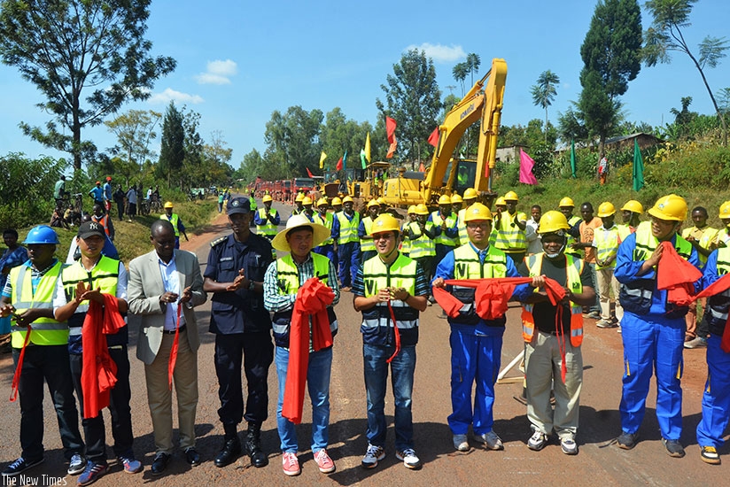 Officials and CRBC engineers launch the 92-kilometre Kayonza-Rusumo road rehabilitation and widening project in Kayonza yesterday. Sam Ngendahimana.