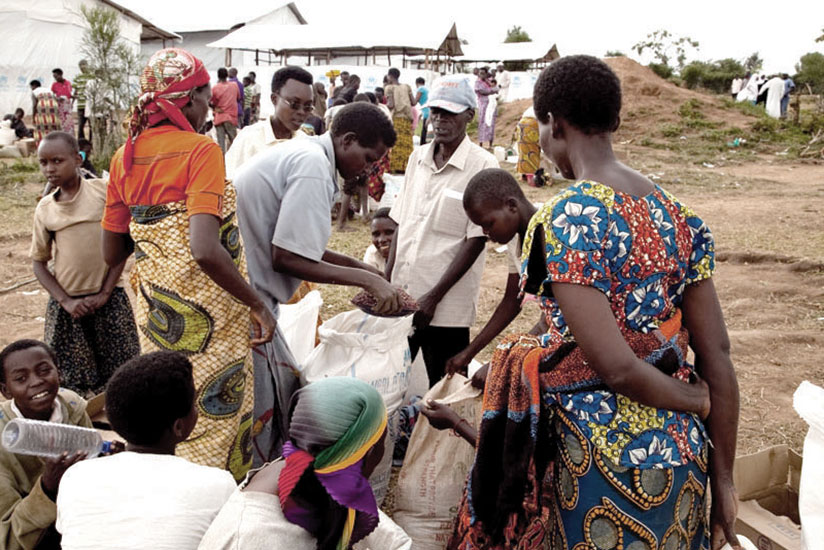 Burundian refugees receive ration at Mahama refugee centre in Kirehe District. / File