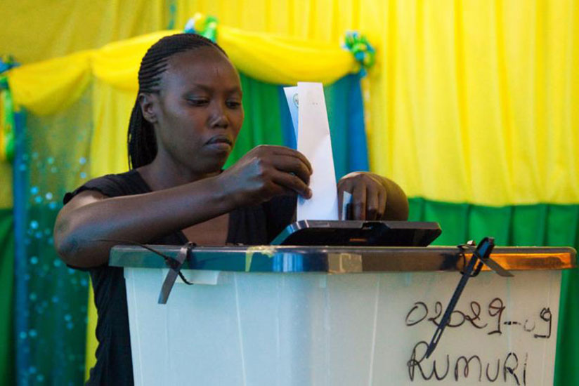 A citizen casting her vote during a past election. / File