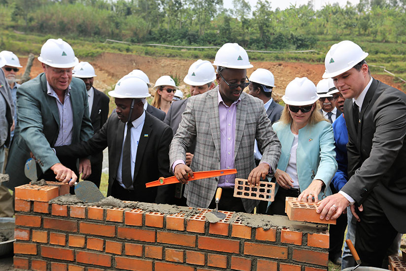 Minister Musoni (C) with Amb. Barks-Ruggles and German Ambassador to Rwanda Peter Woeste, among other officials, during the groundbreaking event in Musanze. / Courtesy