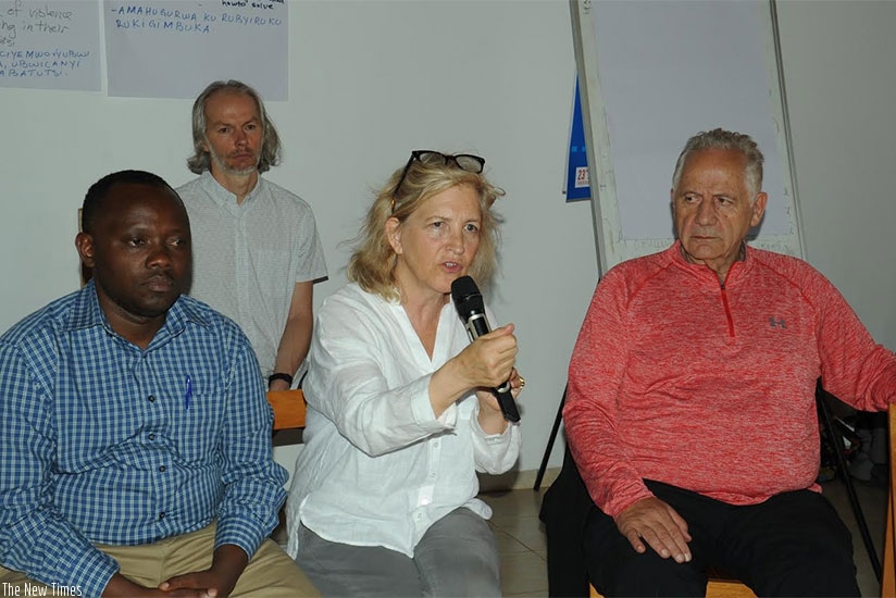 From L-R; Musore, and the  Audergons of the Force for Change, at a reconciliation forum in Kicukiro District. Olivia Muragijimana.