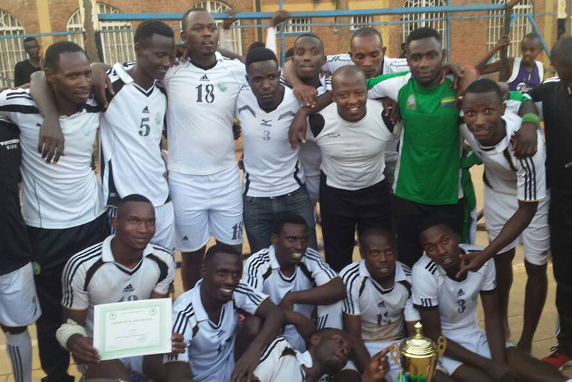 APR players pose for a photo after winning the league title  on Sunday at Kimisagara ground. / Geoffrey Asiimwe