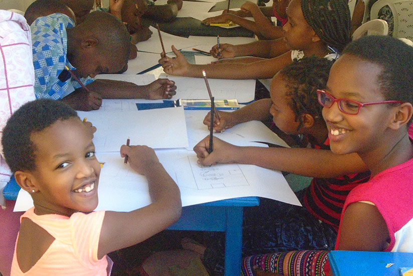 Pupils drawing during the competition. (Lydia Atieno)