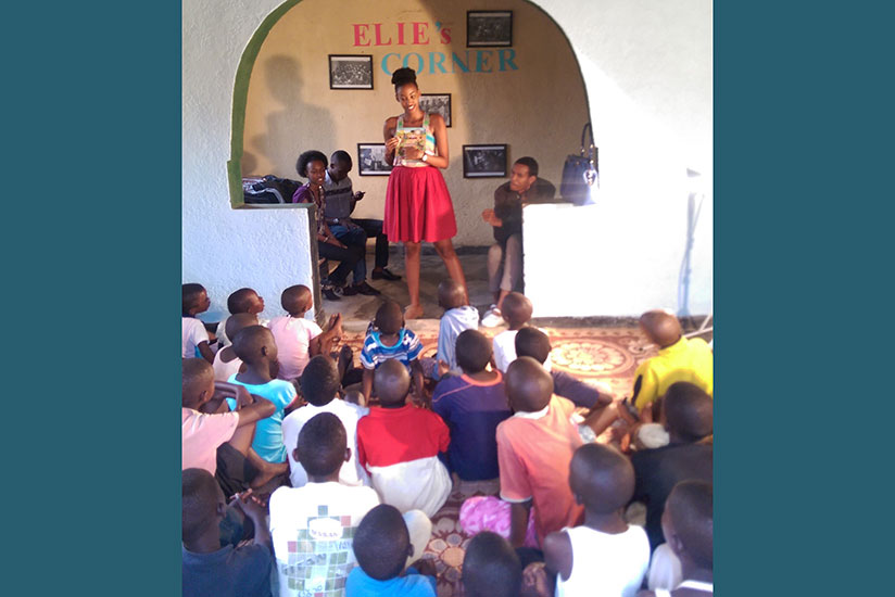 Children books author Peace Kwizera reads one of her books to the children. Learning is the foundation of good ideas. (Dennis Agaba)