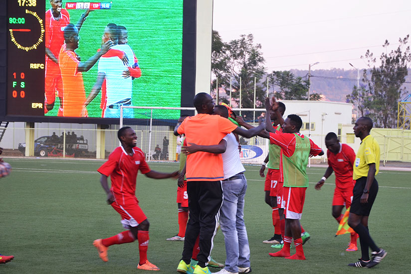 Jimmy Ndizeye, Espoir FC head coach seen here celebrates with his players after shocking Rayon Sports (All photos by Sam Ngendahimana)