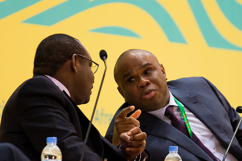 Gatete (L) chats with Dr Oramah during the meeting in Kigali yesterday. (Photos byTimothy Kisambira)