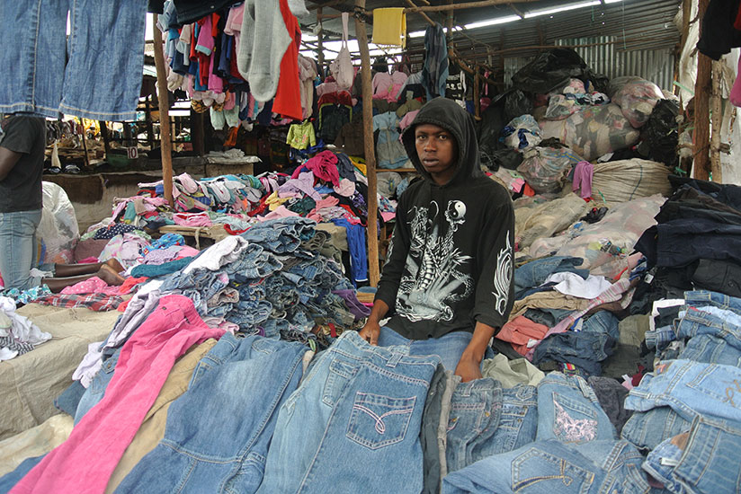 A second-hand clothes vendor at his stall. The ban of used clothes in the East African Community is aimed at promoting the region's textile and leather industries. / Internet photo