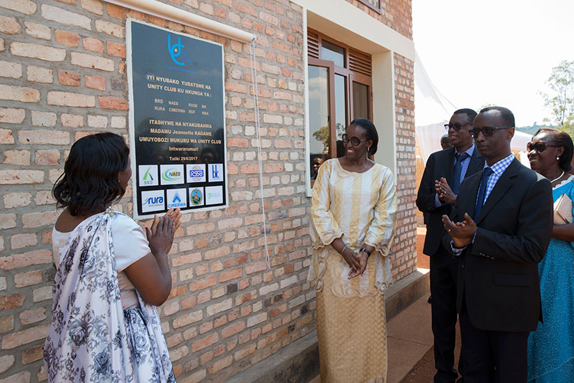First Lady Jeannette Kagame officially inaugurates the Impinganzima Hostel in Mukura Sector, Huye District yesterday. She is flanked by the Vice Governor of the National Bank of Rw....