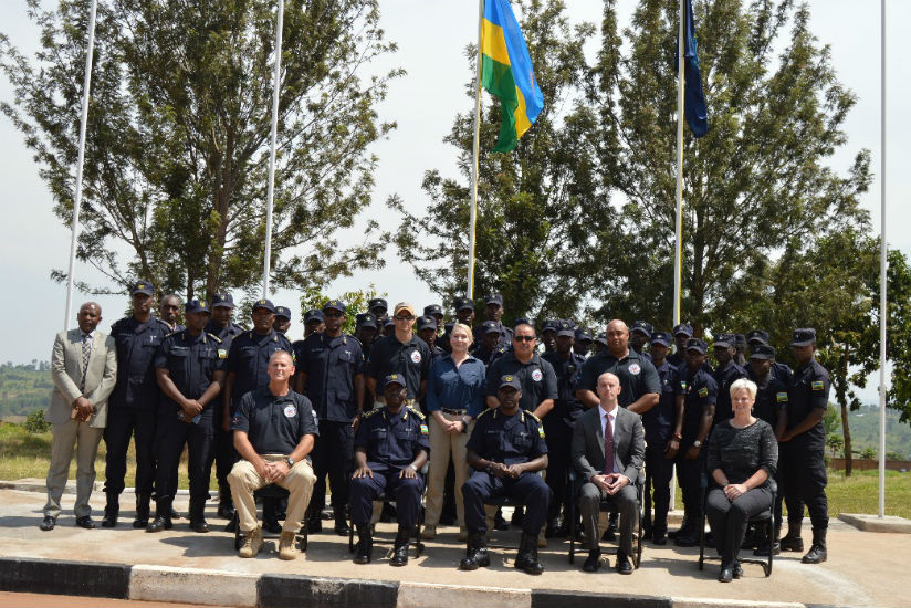 DIGP Dan Munyuza and other officials in a group photo with officers who completed the VIP Protection ToT course. / Courtesy