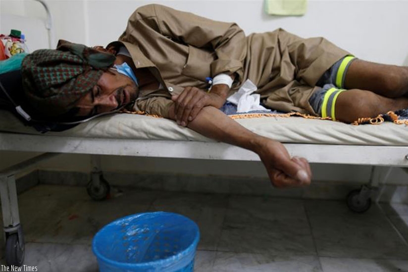 A man lies on the bed of a cholera treatment center in Sanaa, Yemen. Net photo.