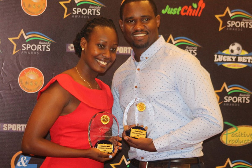 Cricket duo of Carthia Uwamahoro and Eric Dusingizimana were given special recognition awards for setting world records for longest time batting. / Courtesy