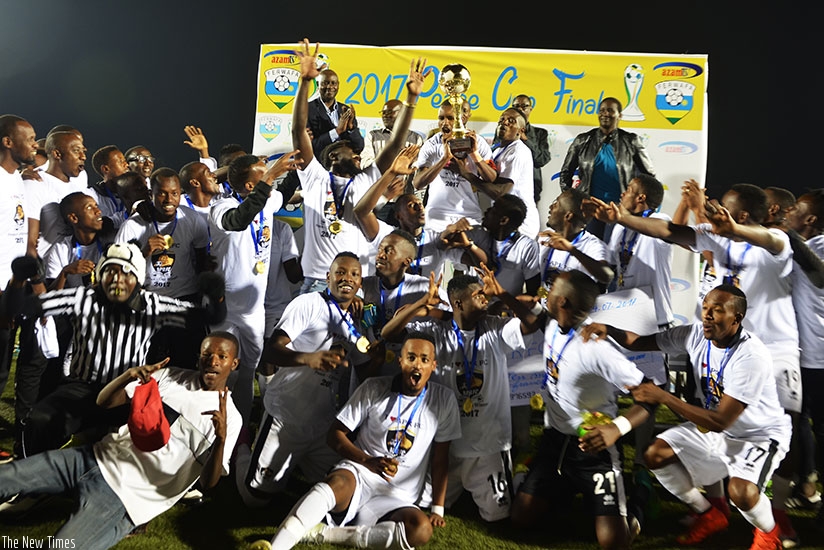 APR players and coaching staff in wild celebrations after being crowned the 2017 Peace Cup champions yesterday. (Photos by Sam Ngendahimana)
