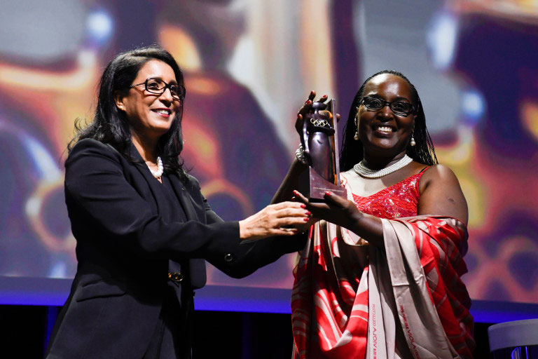 RNOSC Vice president Felicite Rwemalika was awarded the IOC Women and Sport Africa Trophy by the IOC president, Thomas Bach. / Courtesy