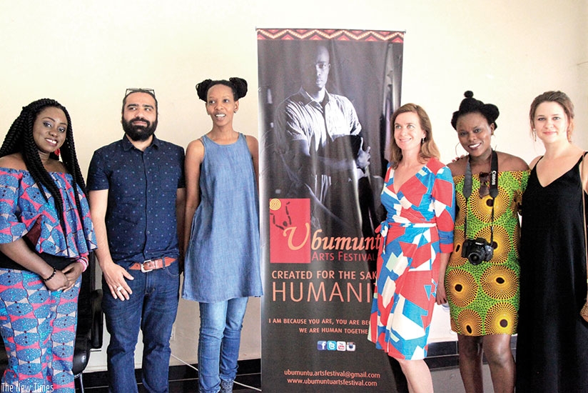 Some of the artistes who arrived for the 3rd Ubumuntu Arts Festival pose for a group photo. Sam Ngendahimana.