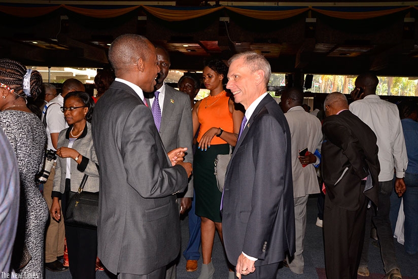 Amb. Kimonyo chats with US Ambassador to Kenya Robert Godec at the event. Courtesy.
