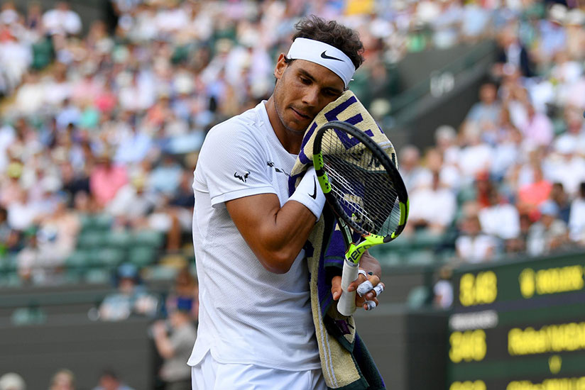 Rafael Nadal out of Wimbledon in stunning fashion as Gilles Muller wins marathon clash. / Net photo