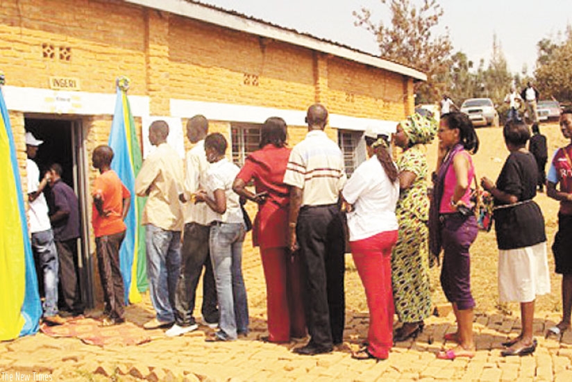 Rwandans exercise their right to vote during  past elections.  (File)
