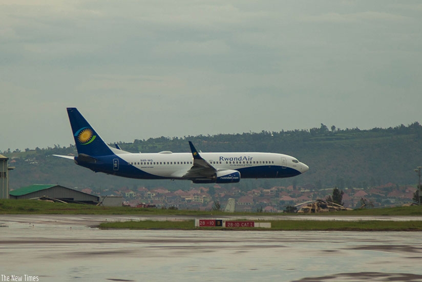 RwandaAir's Boeing 737-800NG performs a low pass at the Kigali International Airport.  (Nadege Imbabazi)