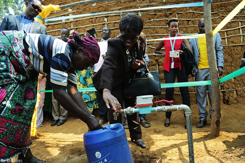 Minister Kamayirese launches the new water project in Nkombo Island in Rusizi District yesterday. (Timothy Kisambira)