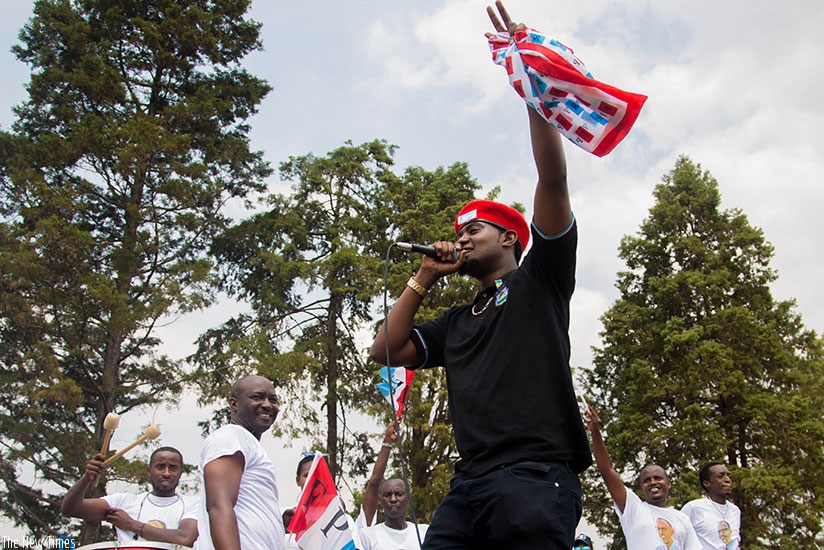 Singer Kitoko arrives on the stage to entertain the participants at Nyanza site. Faustin Niyigena