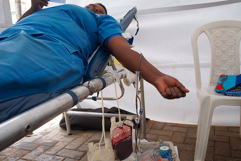 A staff member of King Faisal Hospital in Kigali donating blood recently. / Courtesy photo