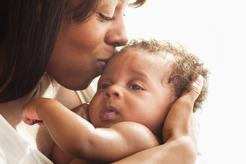 A mother holding a newborn baby. Women who choose to have a C-section even if they have no medical reason need to be counseled and advised about the implications. / Internet photo