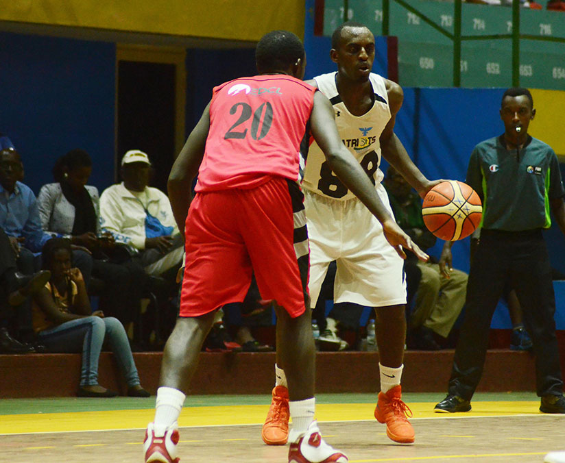 Team captain Aristide Mugabe, right, led Patriots to a 83-77 win over REG to level the playoff finals series at 1-1 on Saturday evening. Game 3 is set for Friday. / Sam Ngendahimana