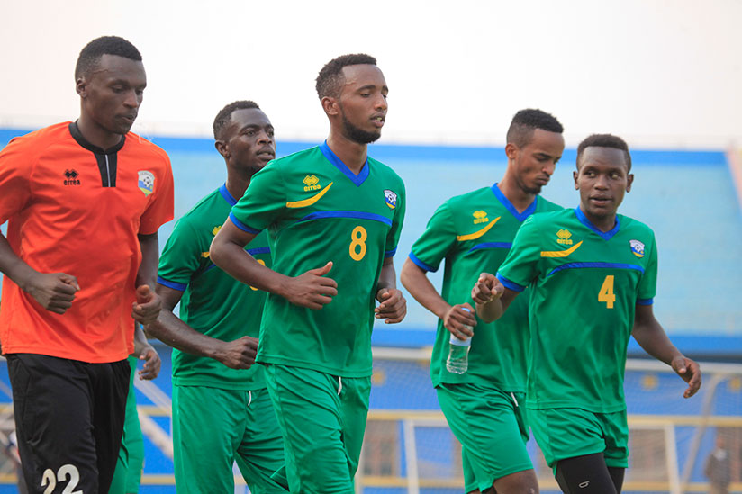 Amavubi players warm up during a training session before heading to Tanzania for the first leg. Rwanda held Taifa Stars to a 1-1 draw on Saturday. / Sam Ngendahimana