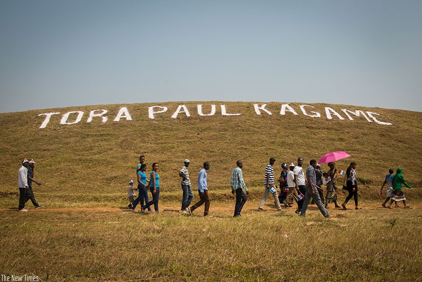 A montage asking people to vote for RPF candidate Paul Kagame on a hill in Huye. Faustin Niyigena.