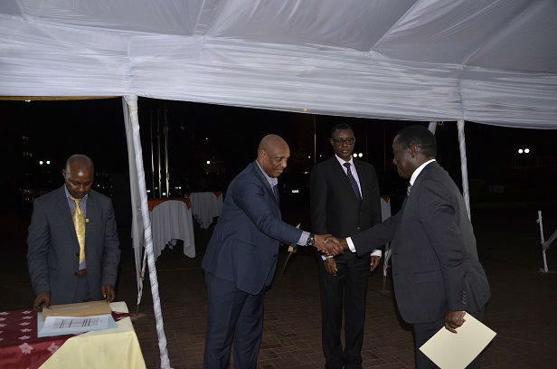 Lt Gen Karenzi Karake is greeted by Chief of Defence Staff Gen Patrick Nyamvumba during the ceremony. / Courtesy