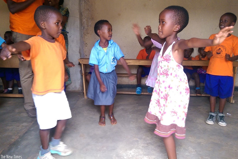 The cultural spirit. Aldrick (L) and Joy(R) practice the Igishakamba traditional  dance.