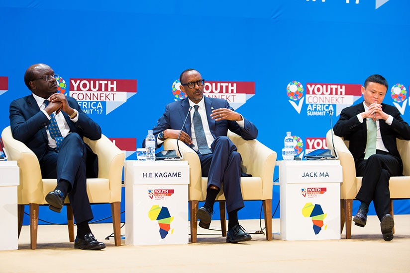 President Kagame speaks on a panel discussion with Jack Ma (R), the founder and chief executive of Alibaba Group, Asia's largest e-Commerce platform, and Dr Mukhisa Kituyi, the sec....