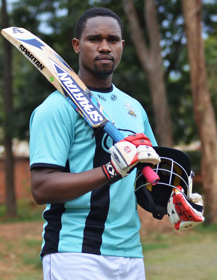Eric Dusingizimana poses for a photo after training at Kicukiro Cricket oval. / Sam Ngendahimana